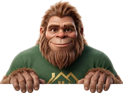 Bigfoot mascot peeking up over an edge