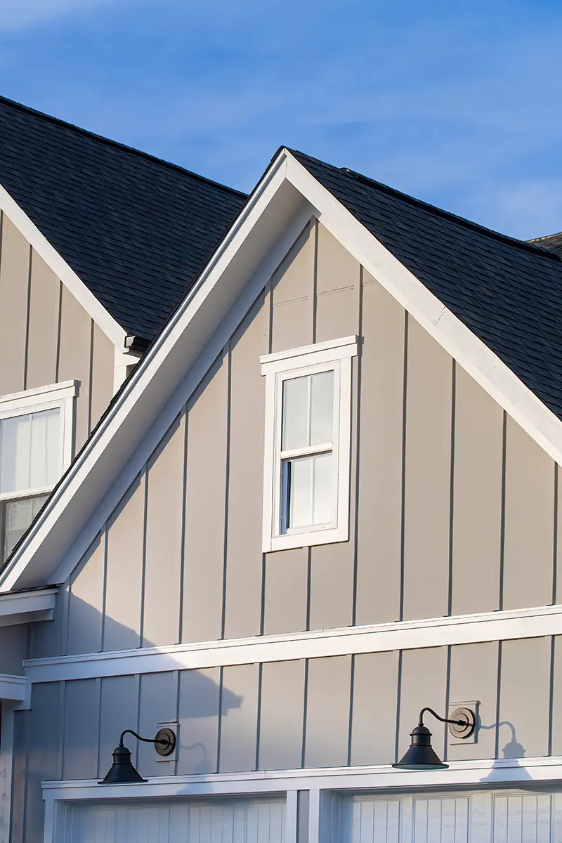 Painted lap siding and trim around a window
