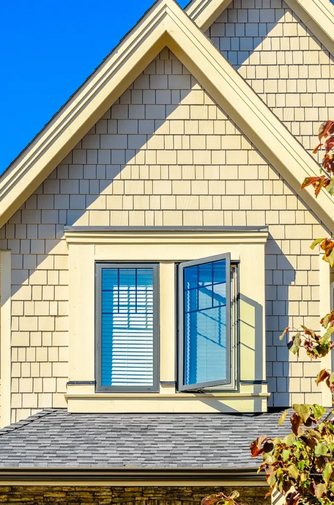New lap siding and trim around a window