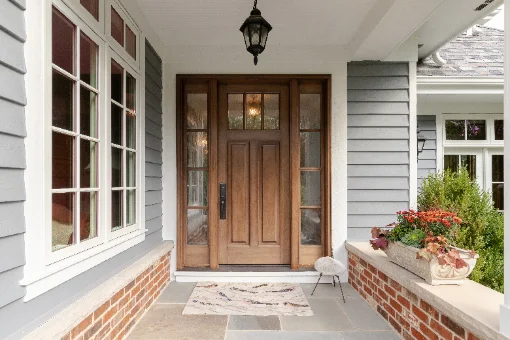 Freshly painted home entry with wood door