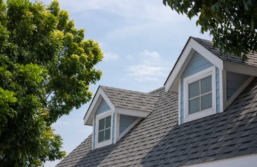 Dormer windows and asphalt shingle roofing